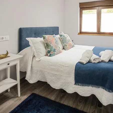 En Llanes 8 Personas *